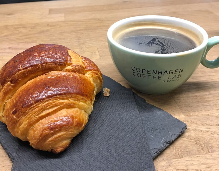 Coffee and croissant at Copenhagen Coffee Lab